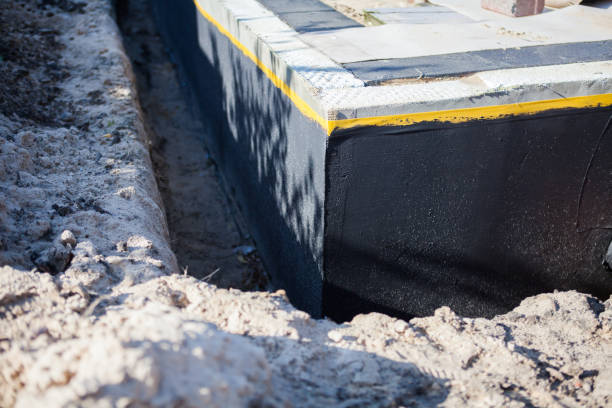 Professional Basement Waterproofing technician working in Cabin John, MD